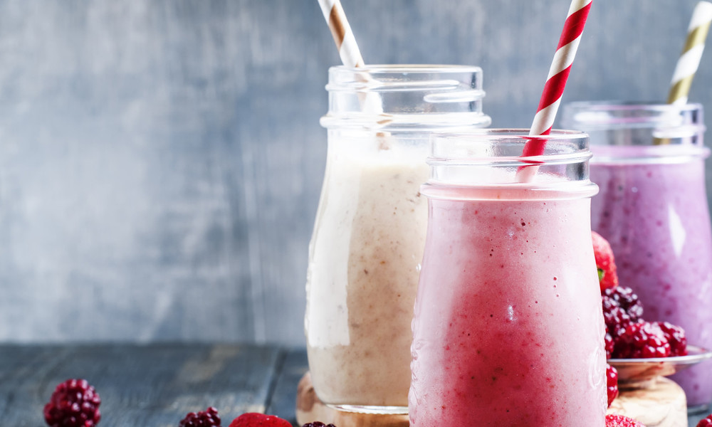 Cocktail with berries in almond milk