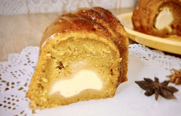 Pumpkin muffin with cream cheese filling