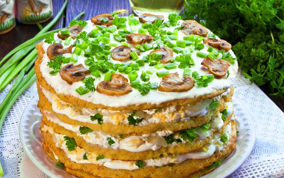 Snack potato cake with melted cheese and eggs