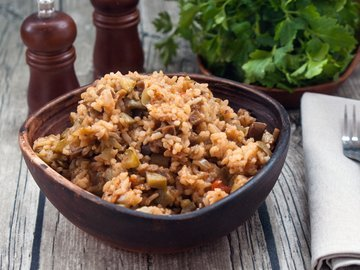 Rice with zucchini and eggplant in a slow cooker