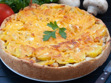 Pie with mushrooms, chicken and potatoes