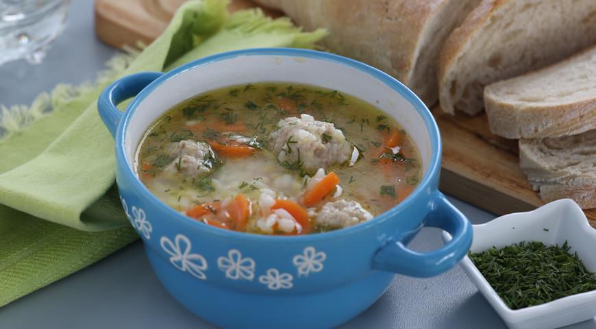 Soup with meatballs and rice