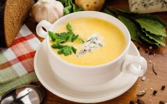 English chicken soup with melted cheese and rice