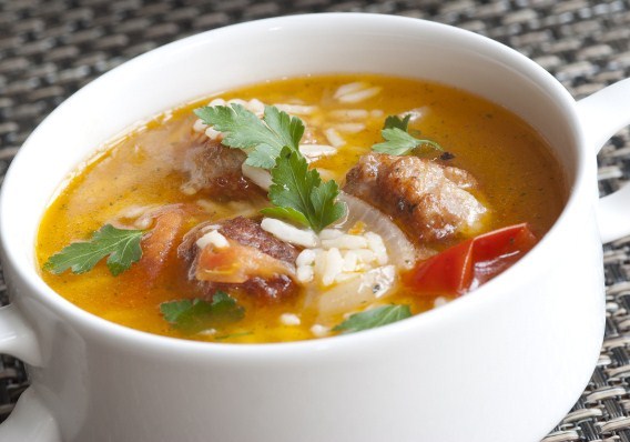 Chicken soup with rice and cheese