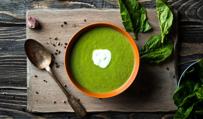 Soup with spinach, green onions and peas