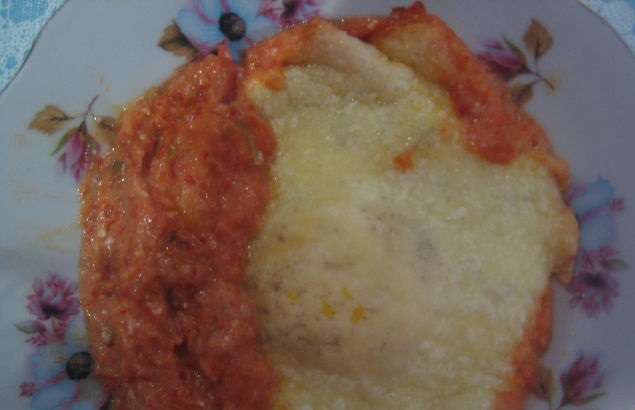 Baked egg in sauce
