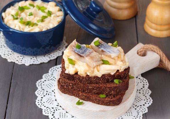 Egg, apple and onion appetizer with herring