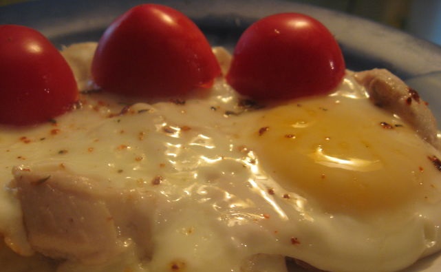 Fried eggs with chicken fillet