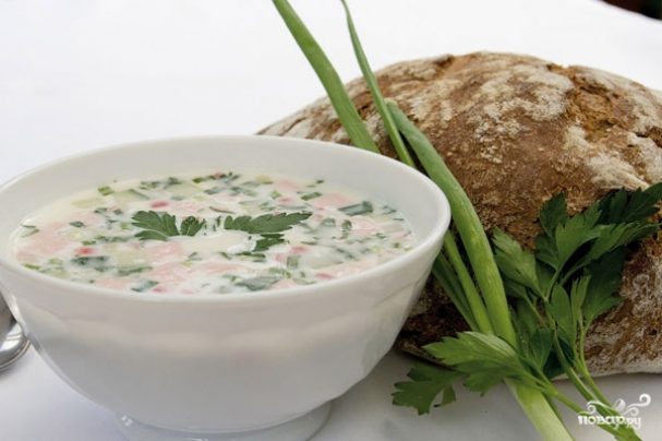 Classic okroshka with sausage on the water