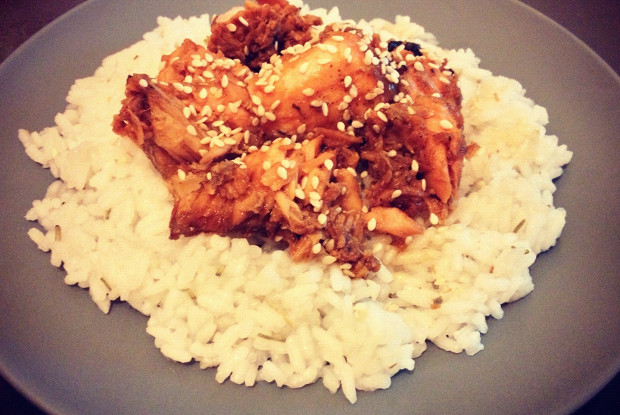 Boiled rice with salmon in sweet and sour sauce
