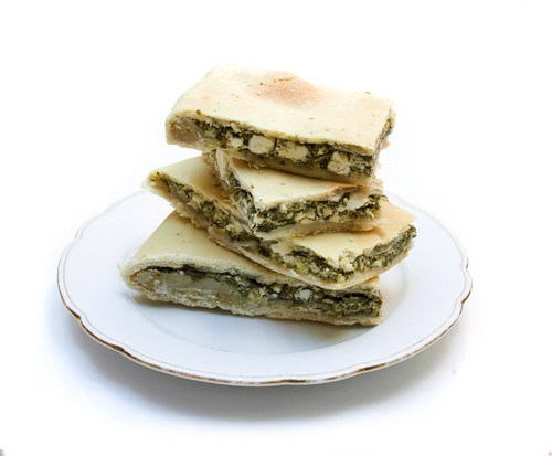 Spinach, zucchini, rice and feta pie
