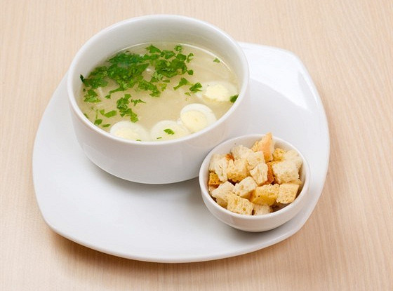 Soup with rice, egg and parsley