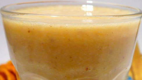 Orange banana smoothie with almonds