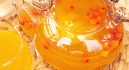 Festive sea buckthorn tea with orange