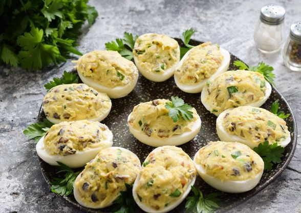 Eggs stuffed with cheese and mushrooms