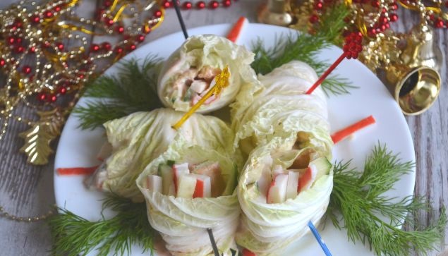 Peking cabbage rolls with crab sticks and egg pancake