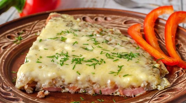 Omelet with buckwheat, sausages and cheese