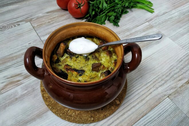 Potato Grandmother With Meat And Mushrooms In The Oven