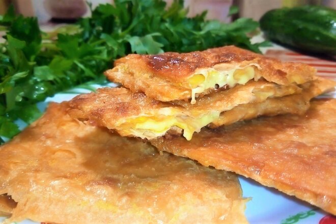 Lavash With Cheese In An Egg In A Pan