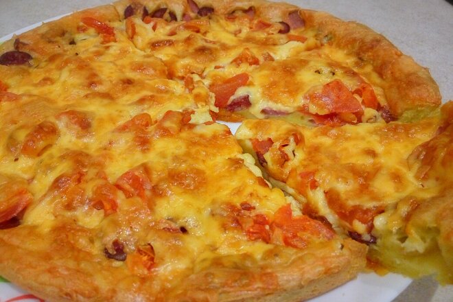Pouring Pizza With Mayonnaise In The Oven