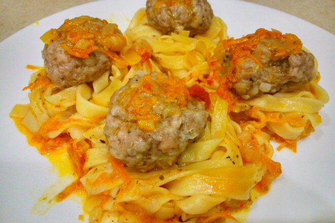 Pasta Nests With Minced Meat And Gravy In A Frying Pan