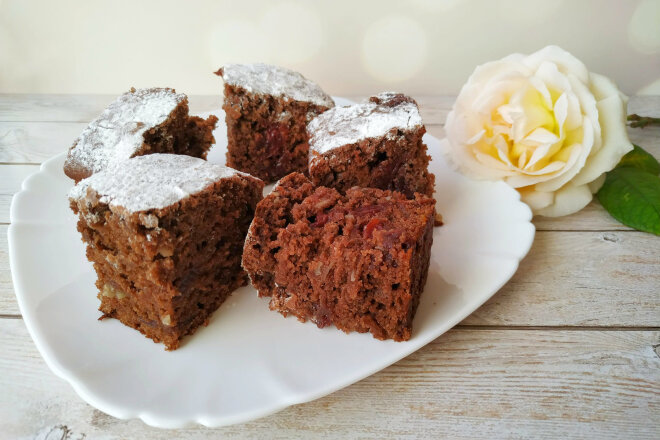 Chocolate Brownie With Cherry And Almond Flakes