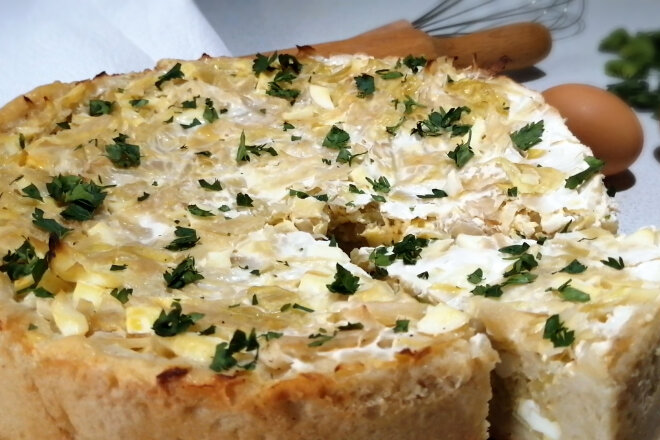 Open Yeast Pie With Milk With Cabbage And Egg