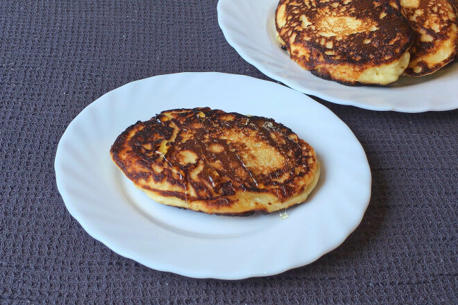 Cottage Cheese Pancakes And Sour Cream In A Pan